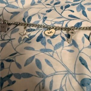 Silver Charm Bracelet by Micheal Kors